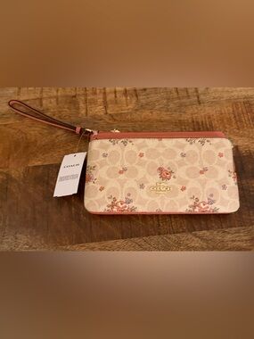 Coach Floral Logo Wristlet in Cream and Pink